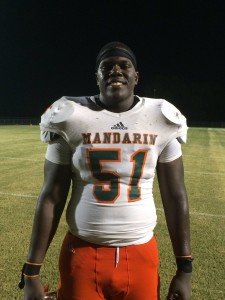 Mandarin senior defensive lineman Terrance Curry (51) was consistently disrupting plays all night while accumulating two sacks as well. 