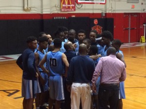 Ribault huddles up during a timeout of its semi-final game with Englewood. 